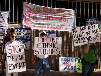 Students and teachers from the Raza Studies program protest to protect ethnic studies programs in Arizona's public schools.
